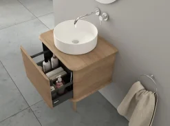 Baden Meuble sous-vasque à suspendre l.61 cm avec plan de toilette, vasque à poser et pieds H.29 cm, effet chêne tabac, Idra* Meuble Buanderie